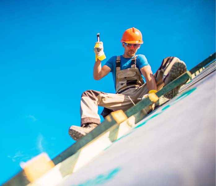 Roofing Contractor Installing New Roof On A Commercial Property In Tempe, AZ